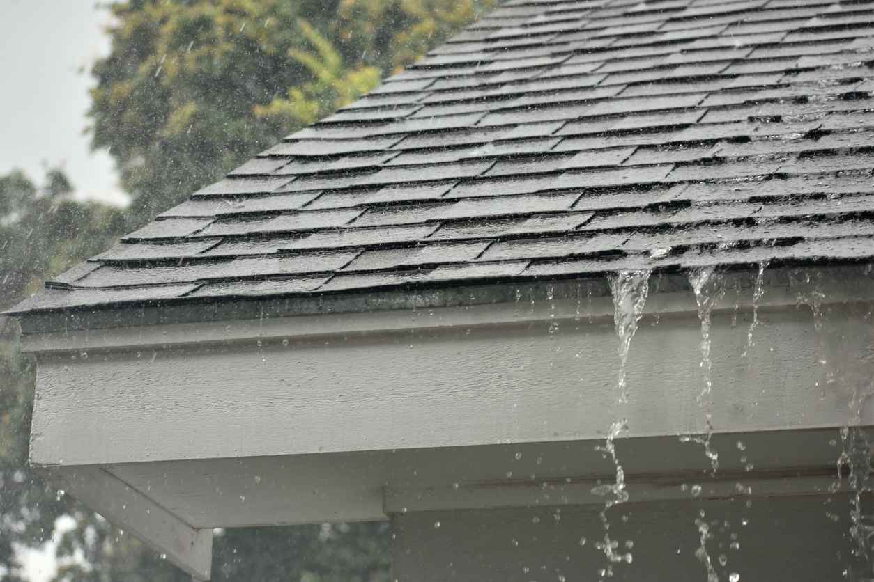 Roof shingles standing strong against rain