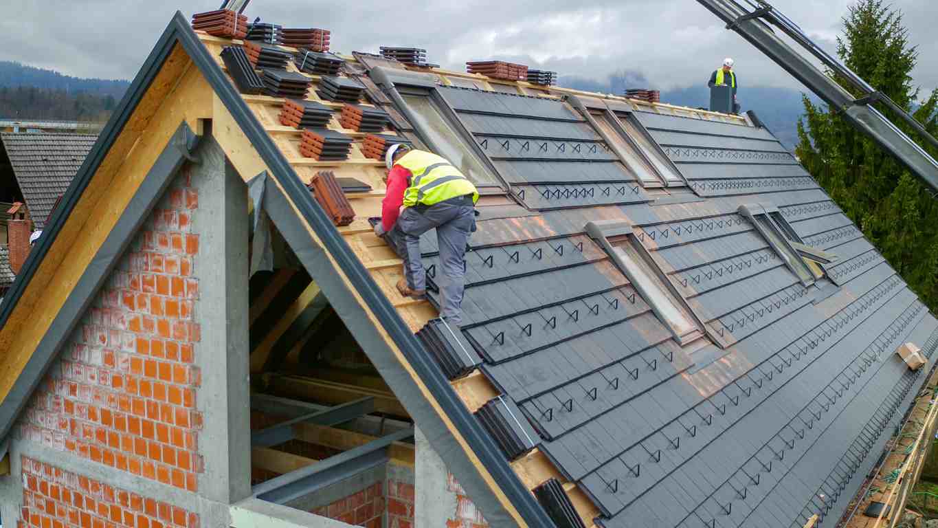 Workers building a strong impact resistant roof